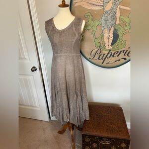 Elegant Sleeveless Dress with handkerchief hem